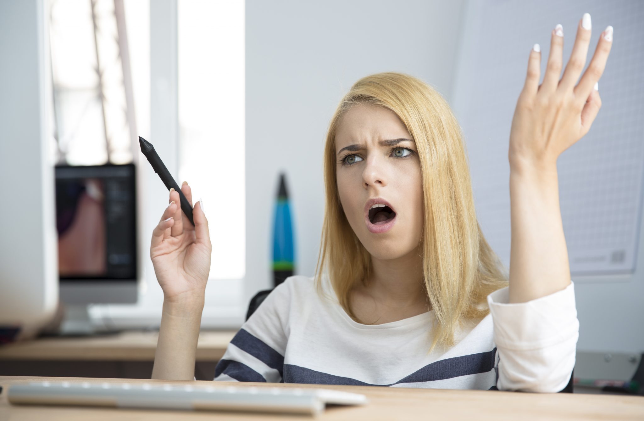 Angry woman working on compute
